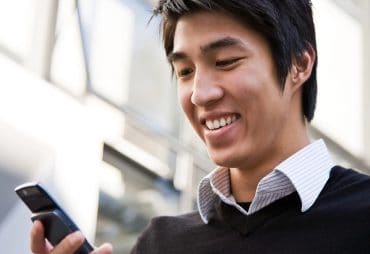 Man texting on a phone