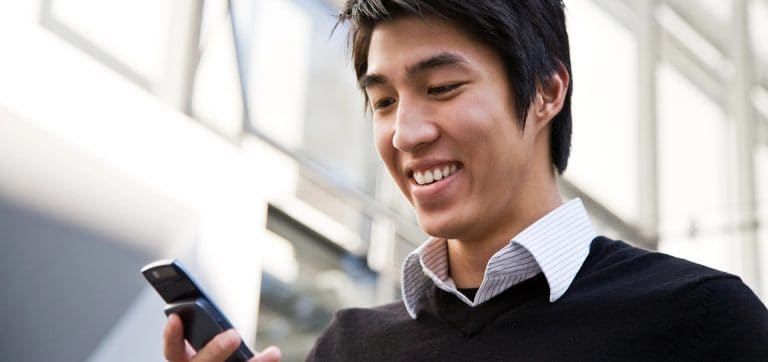 Man texting on a phone